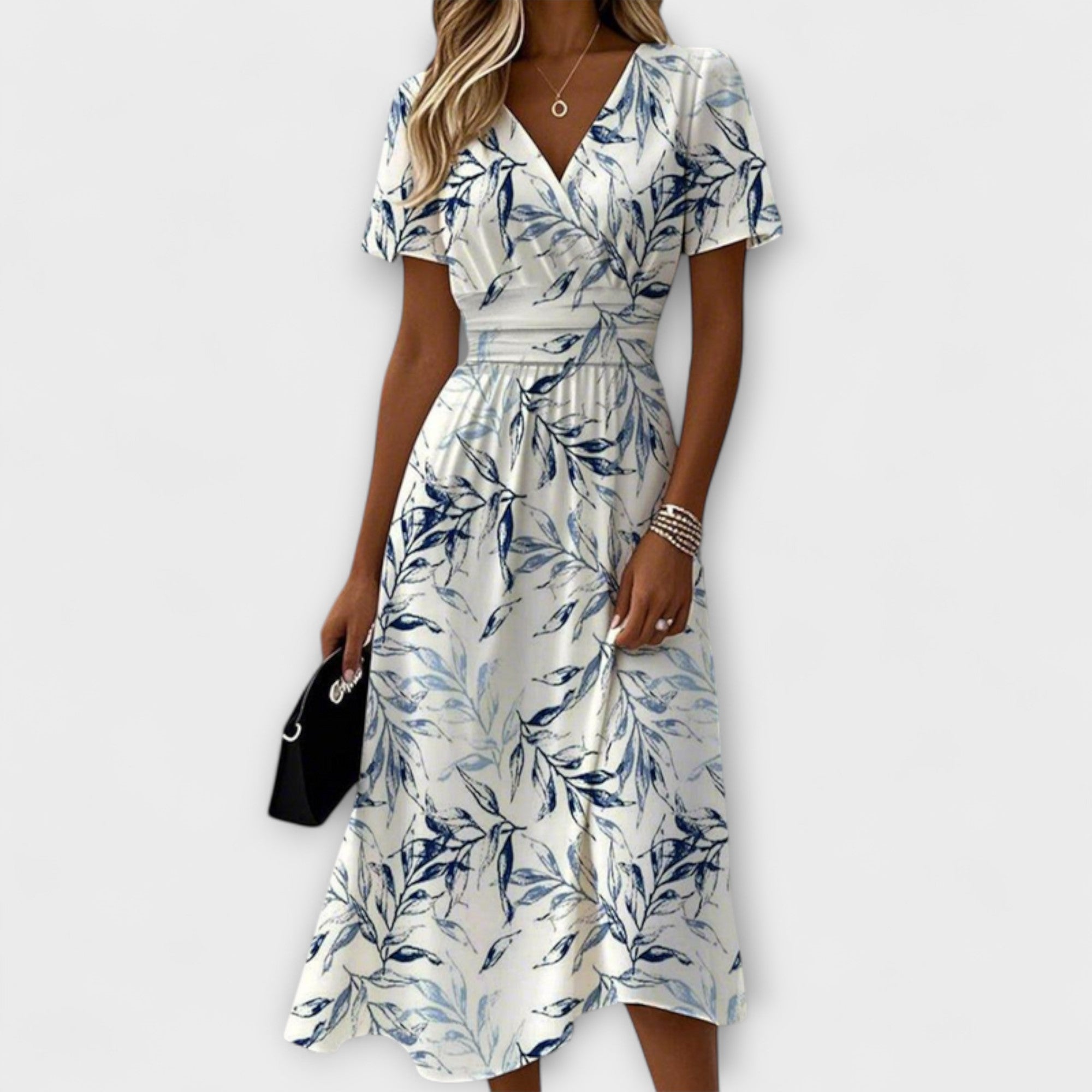 Katie - Graciös blomsterklänning