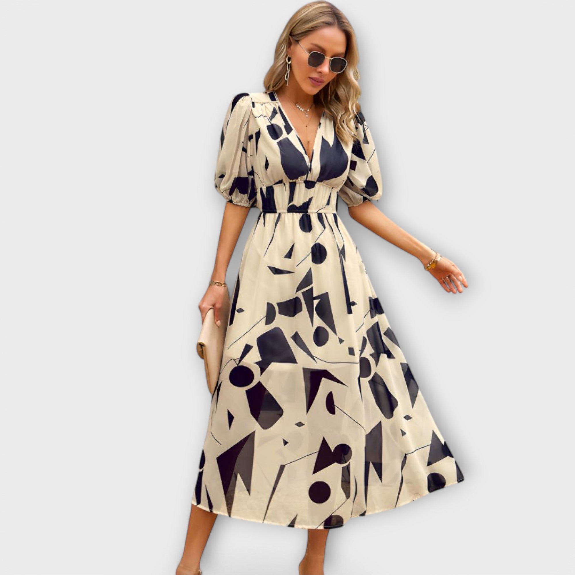Abstract maxi-jurk met pofmouwen